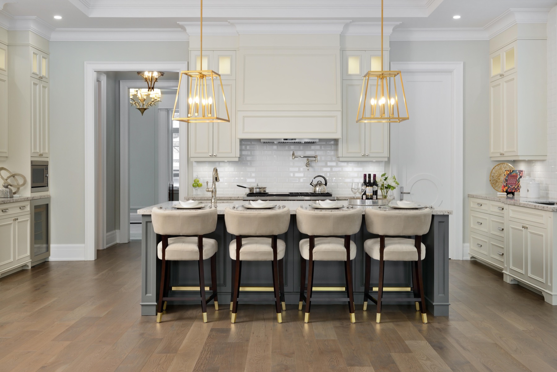 White kitchen with brass lanterns